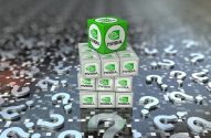 Pilha de cubos NVIDIA (um verde no topo) sobre grade digital com múltiplos pontos de interrogação.