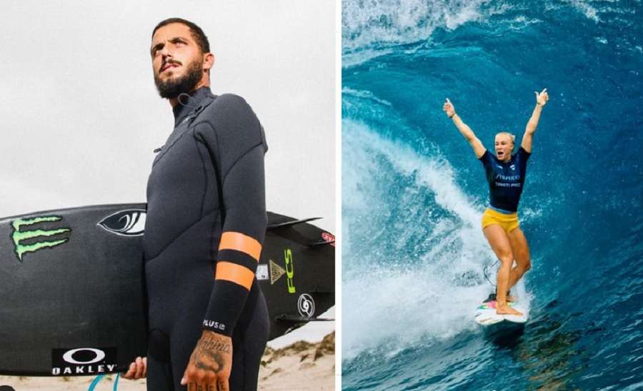 Homem surfista com prancha na areia e mulher surfista celebra em onda azul.
