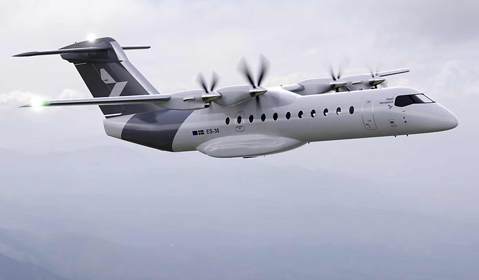 Avião a hélice Heart Aerospace ES-30, cinza e branco, em voo contra céu nublado.