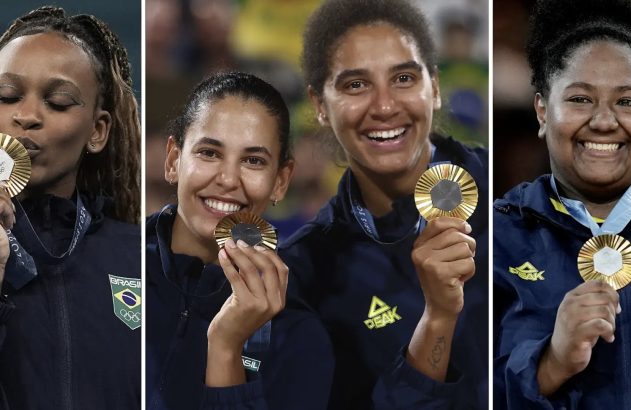 Quatro atletas brasileiras sorrindo com suas medalhas de ouro. Uma beija a medalha, as outras as exibem.