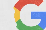 A imagem apresenta o logo estilizado da Google (com um desenho sugerindo uma "mordida"do lado esquerdo), com a letra "G" dividida em segmentos vermelhos, verdes, azuis e amarelos, sobre um fundo cinza claro com pequenas manchas brancas.
