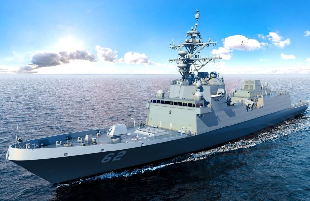 Navio de guerra cinza, número 62, navegando em alto mar azul sob céu ensolarado, deixando um rastro.