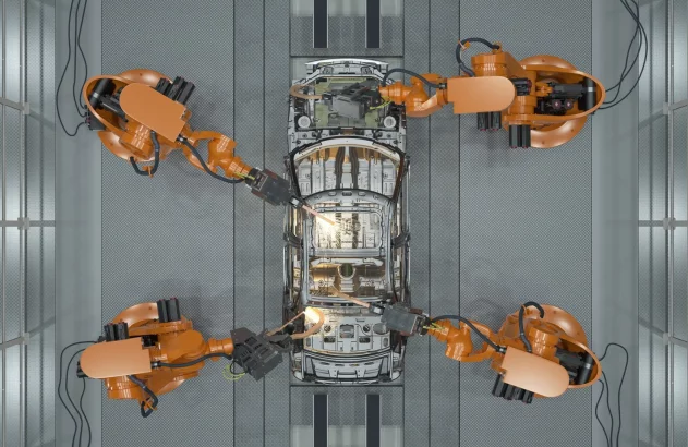 Quatro robôs industriais montam carroceria em fábrica, com soldagem.