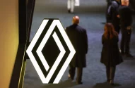 a sign with a renault logo shaped design