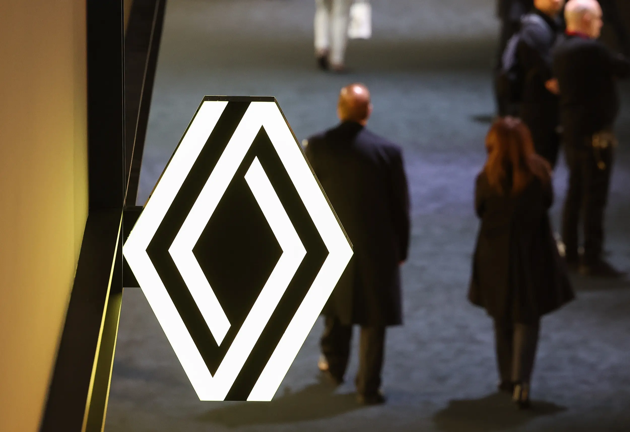 a sign with a renault logo shaped design