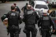 a group of police officers walking down a street