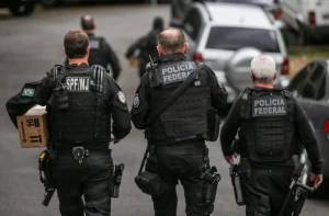 a group of police officers walking down a street