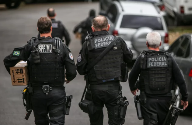 a group of police officers walking down a street