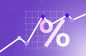 Imagem mostra um símbolo de percentual em um fundo roxo com um gráfico de linha apontado para cima