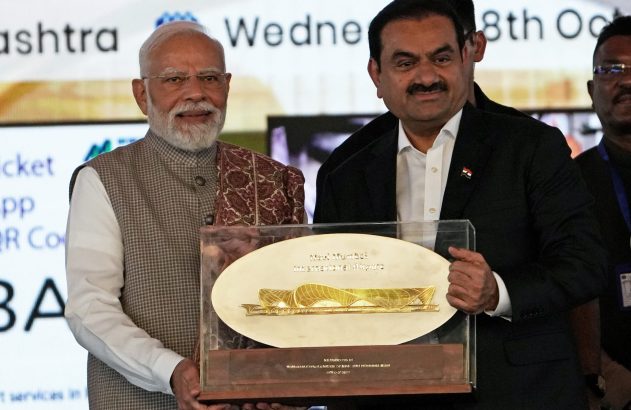 Narendra Modi, primeiro-ministro da Índia, e o empresário Gautam Adani