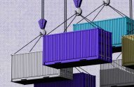 Contêineres sendo içados num porto