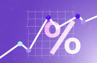 Imagem mostra um símbolo de percentual em um fundo roxo com um gráfico de linha apontado para cima