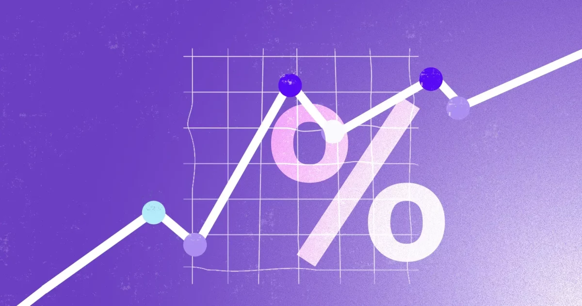 Imagem mostra um símbolo de percentual em um fundo roxo com um gráfico de linha apontado para cima