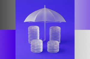 Viver de renda: guarda-chuva protegendo moedas, em alusão aos cuidados para proteger os investimentos